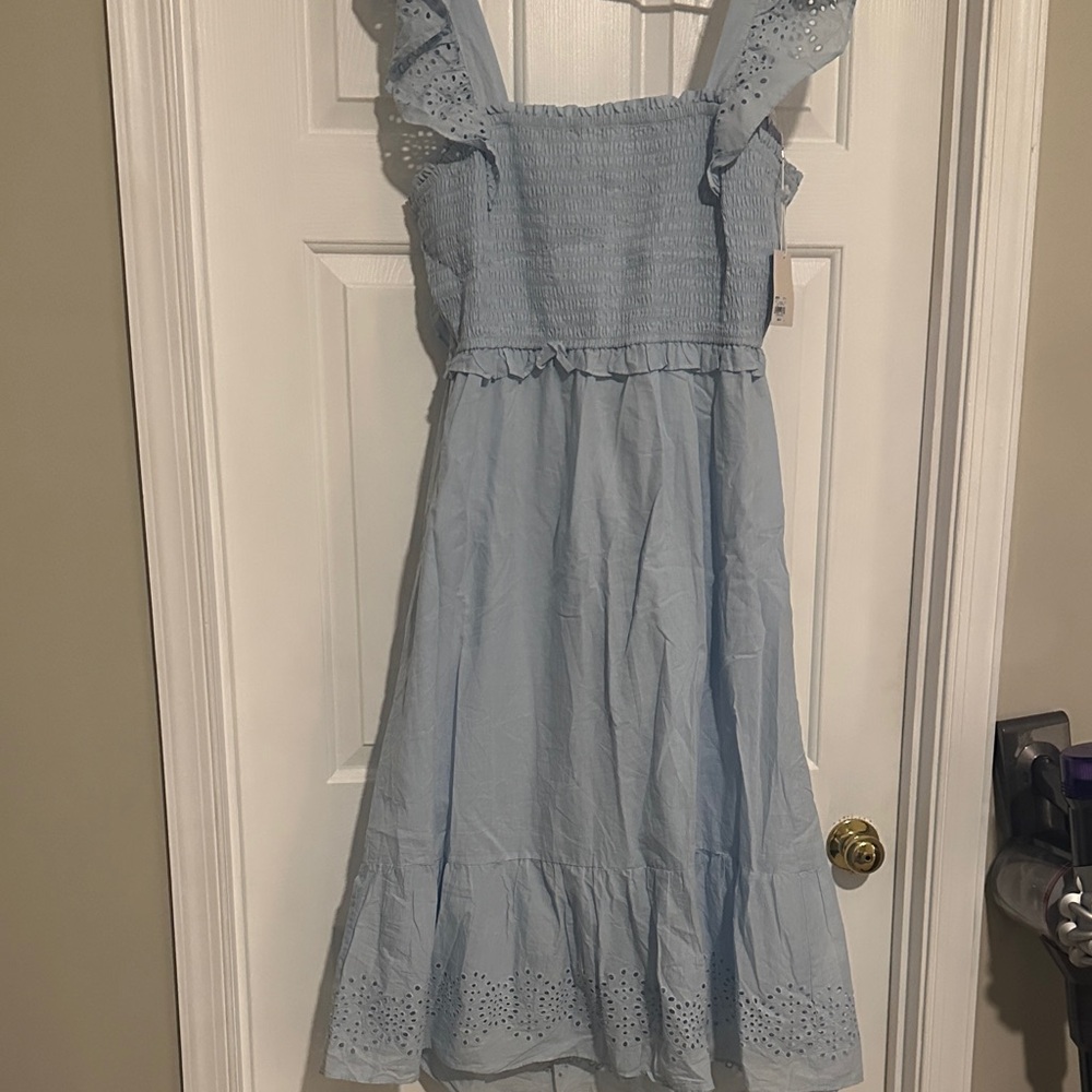 Baby blue eye lit dress with open back